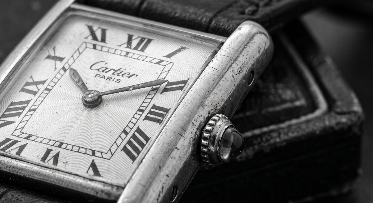 montre cartier pour réparation atelier ulmann